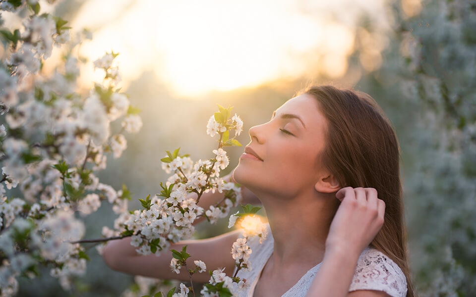 Girl smelling flower Girl smelling flower